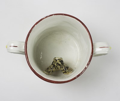 Lot 70 - A Staffordshire Toby jug modelled as a...