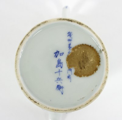 Lot 293 - A Japanese blue and white sake pourer,...