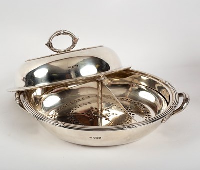 Lot 7 - A silver circular vegetable dish and cover,...