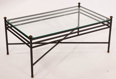 Lot 621 - A rectangular wrought iron coffee table with a...