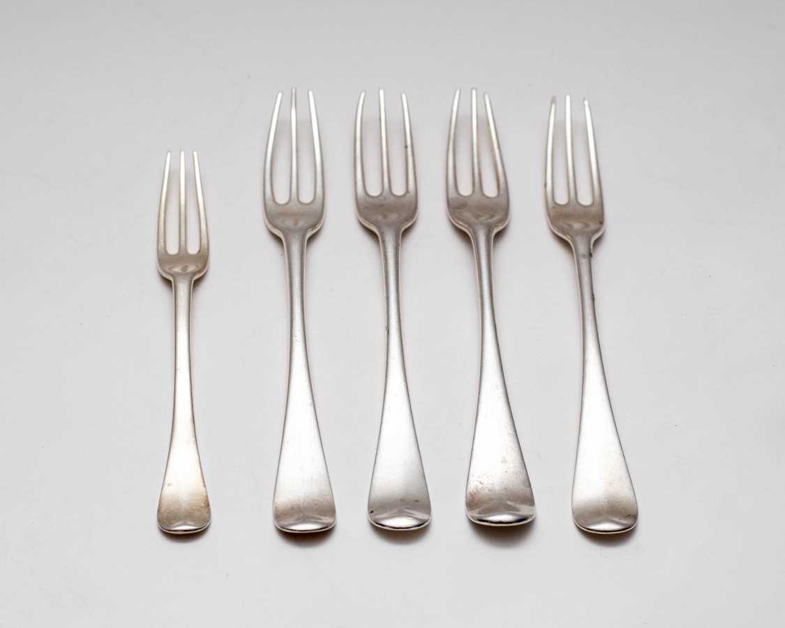 Lot 24 - A set of four George II silver sweet meat...