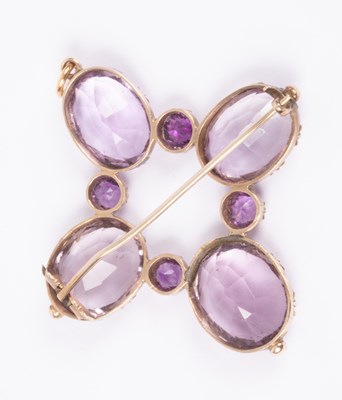 Lot 85 - A 19th Century yellow metal and amethyst brooch/pendant