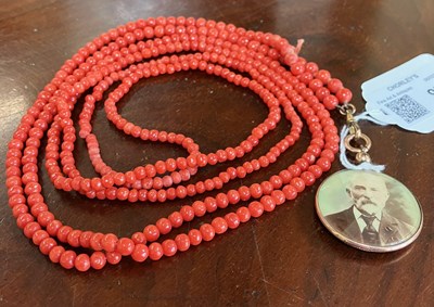 Lot 97 - A long coral guard chain