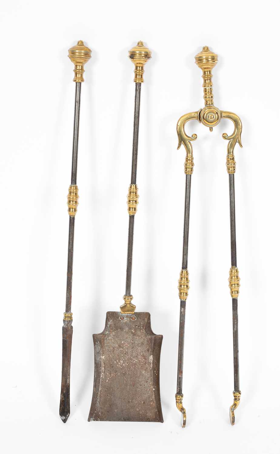 Lot 8 - A set of three brass mounted burnished steel fire irons