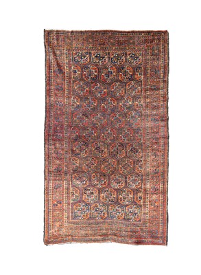 Lot 649 - A small Belouch carpet
