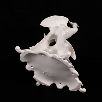 Lot 542 - A Continental white glazed porcelain group