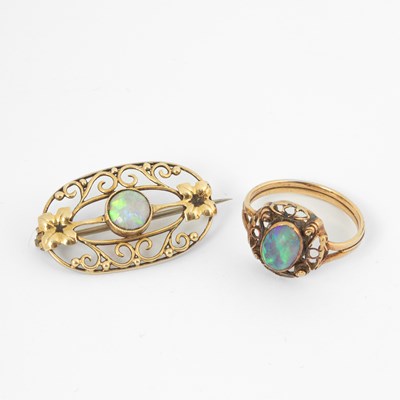 Lot 110 - An Art Nouveau 15ct yellow gold and opal brooch