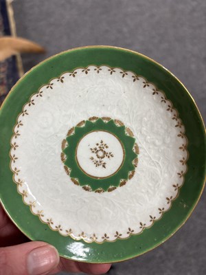 Lot 516 - A Worcester chrysanthemum-moulded teabowl and saucer