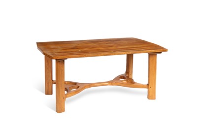Lot 17 - An Arts & Crafts style elm dining table
