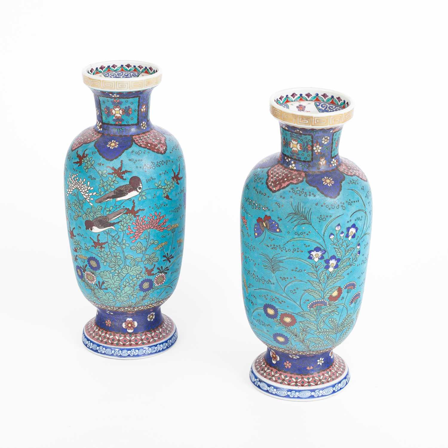 Lot 244 - A pair of Japanese cloisonne on porcelain vases