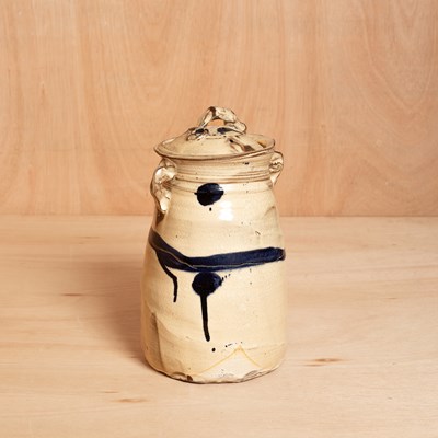 Lot 460 - Johannes Peters, a slipware lidded two-handled pot