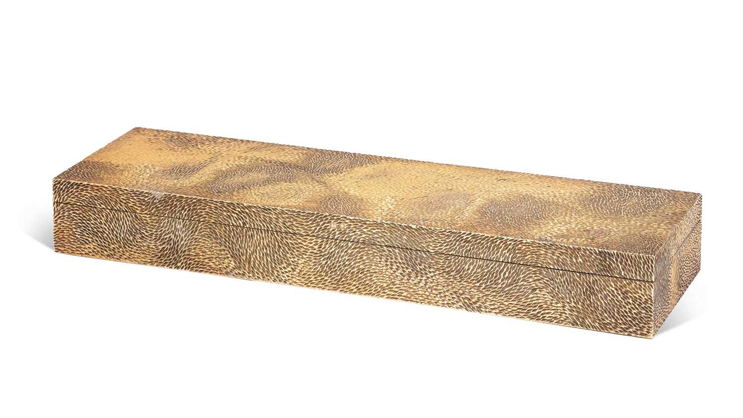 Lot 24 - Stuart Devlin (1931-2018) A textured silver gilt cigar box