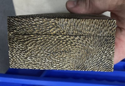 Lot 24 - Stuart Devlin (1931-2018) A textured silver gilt cigar box