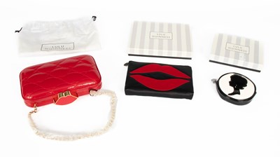 Lot 373 - A Lulu Guinness FiFi red leather clutch bag