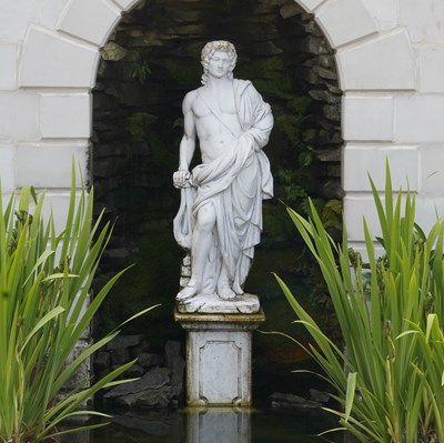 Lot 502 - A composition stone figure of Orpheus