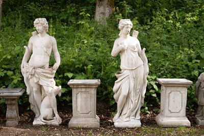 Lot 503 - A pair of composition stone figures