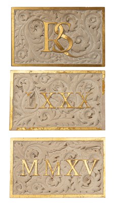Lot 505 - Three composition stone wall appliques