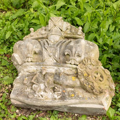 Lot 511 - A carved stone fragment depicting a crown
