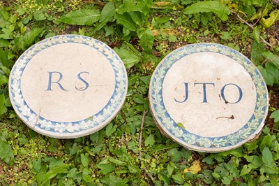 Lot 518 - Two composition stone wall plaques