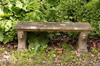 Lot 522 - A composition stone bench