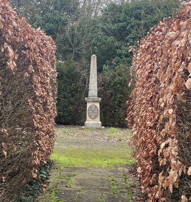 Lot 523 - A composition stone obelisk
