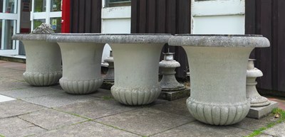 Lot 530 - A set of four Haddonstone 'Versailles' vases