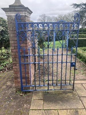 Lot 531 - A blue-painted cast iron gate