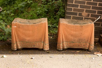 Lot 547 - Two composition stone garden seats modelled as draped stools