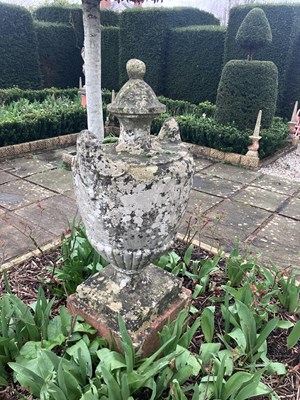 Lot 568 - A composition stone urn