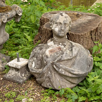 Lot 572 - A composition stone bust