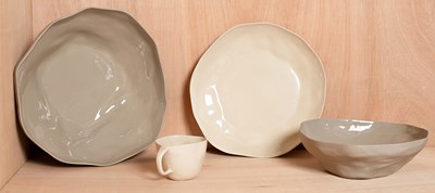 Lot 438 - A set of three Amai pottery bowls