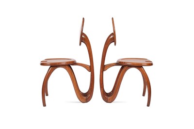 Lot 301 - A pair of mahogany chairs by Luca & Paolo Giacomuzzi