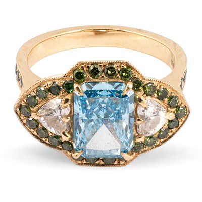Lot An 18ct yellow gold and diamond three-stone halo ring