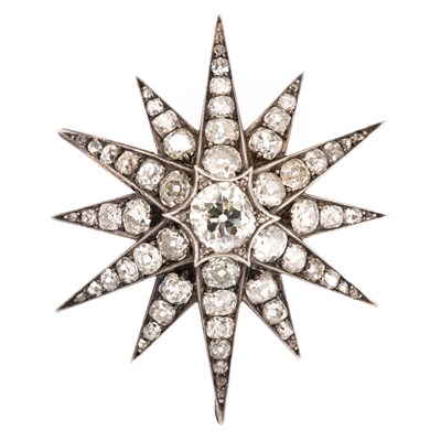 Lot A Victorian white metal diamond starburst brooch